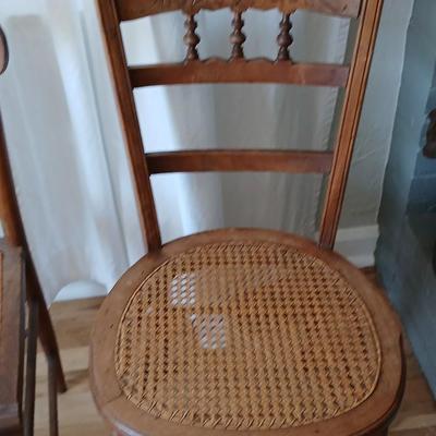 Antique side chairs - cane seats - 1 fiddle back spindle legs - one spindle back with ornate carving
