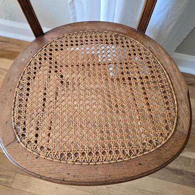 Antique side chairs - cane seats - 1 fiddle back spindle legs - one spindle back with ornate carving
