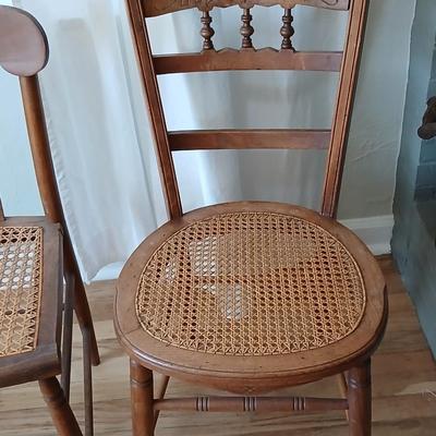 Antique side chairs - cane seats - 1 fiddle back spindle legs - one spindle back with ornate carving
