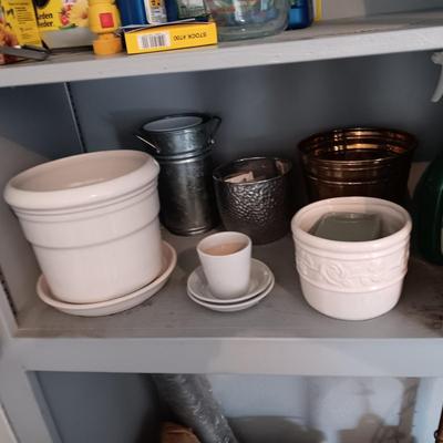 A VARIETY OF FLOWER POTS