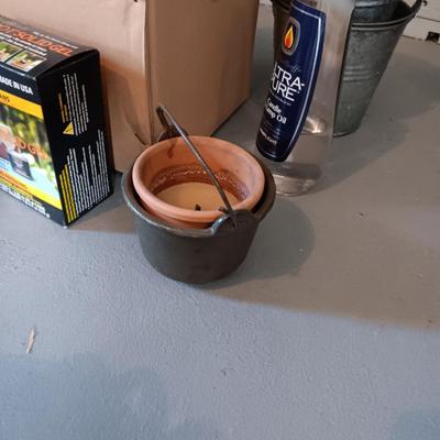 LARGE FIRE POT WITH GEL AND OTHER PATIO ITEMS TO KEEP THE BUGS AWAY