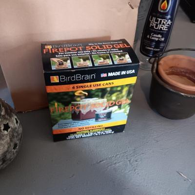LARGE FIRE POT WITH GEL AND OTHER PATIO ITEMS TO KEEP THE BUGS AWAY