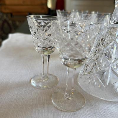 13 various Waterford small sipping glasses with crystal bell