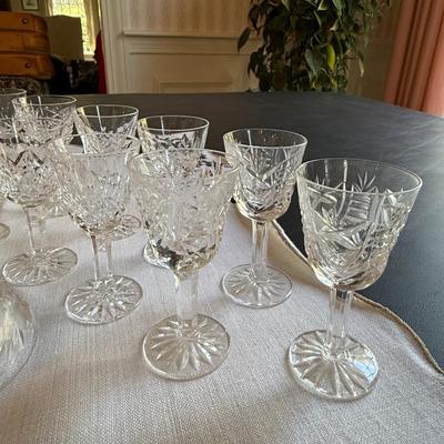 13 various Waterford small sipping glasses with crystal bell