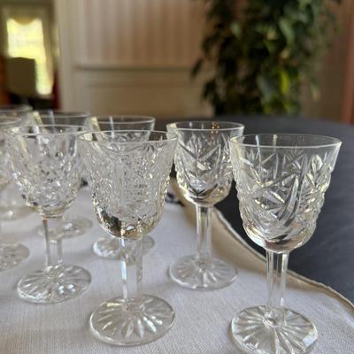 13 various Waterford small sipping glasses with crystal bell
