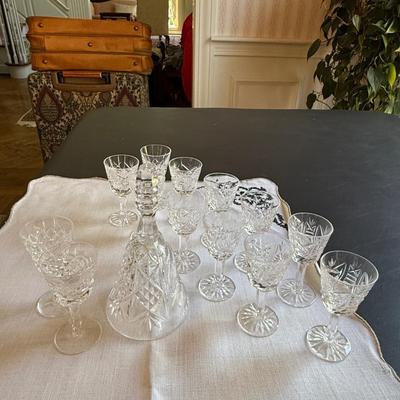 13 various Waterford small sipping glasses with crystal bell
