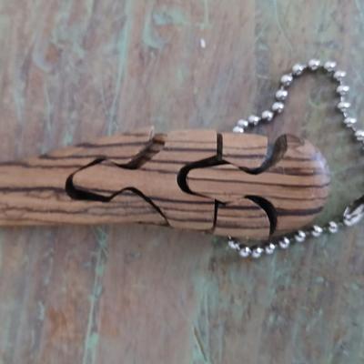 Adorable wooden mouse rodent and a wooden whale keychain