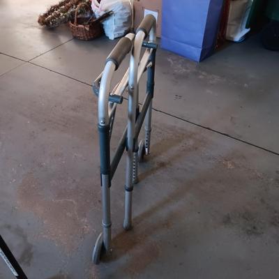 FOLDING WALKER AND A 4 FOOTED CANE