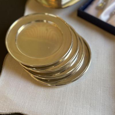 Set of silver plate coasters, candy dishes and other silver items