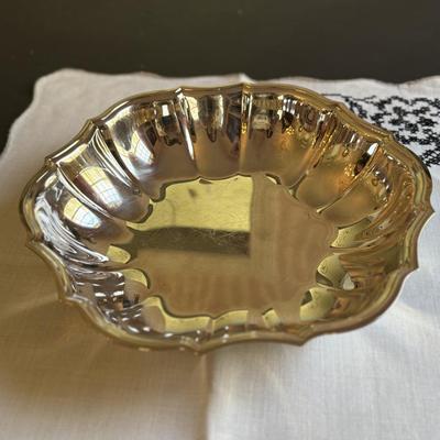 Set of silver plate coasters, candy dishes and other silver items