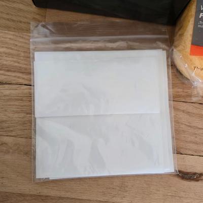 Windshield WOW cloths and sponges and a Ziplock baggie of large sized rubber bands