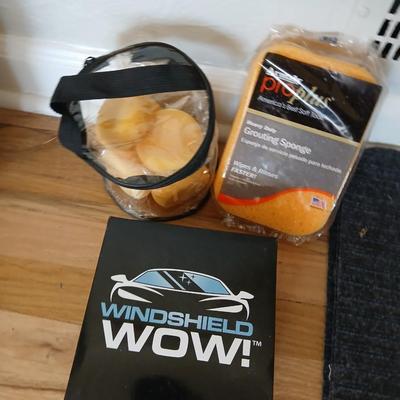 Windshield WOW cloths and sponges and a Ziplock baggie of large sized rubber bands