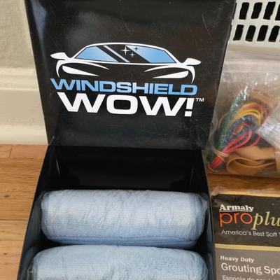 Windshield WOW cloths and sponges and a Ziplock baggie of large sized rubber bands