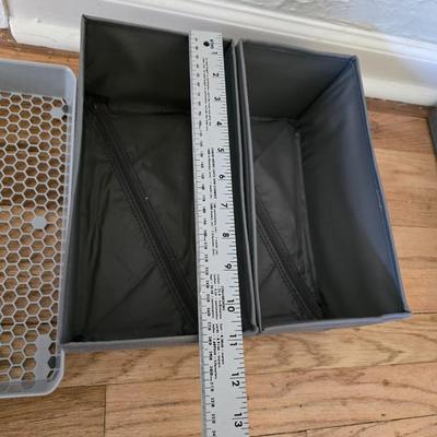 Five Cloth storage baskets and one plastic storage container