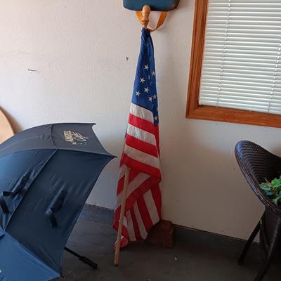 HUGE AMSTEL LIGHT UMBRELLA, US FLAG ON POLE AND A UNC BLEACHER CUSHION