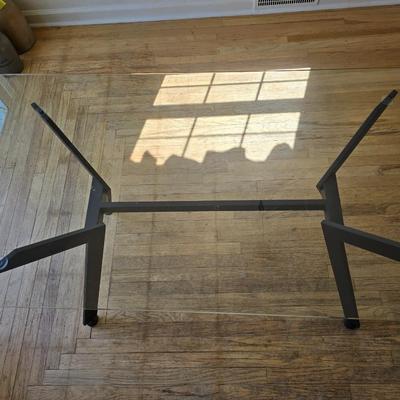 Strut glass topped Dining room / Kitchen table / Desk with black frame legs