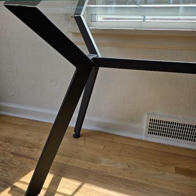 Strut glass topped Dining room / Kitchen table / Desk with black frame legs