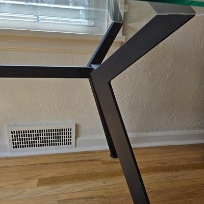 Strut glass topped Dining room / Kitchen table / Desk with black frame legs