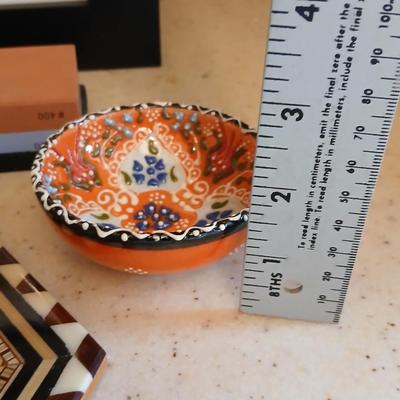 Assortment of collectible Kitchen items - inlayed trivet - Two Turkish bowls - Knife sharpening whetstone - cute, framed sheep