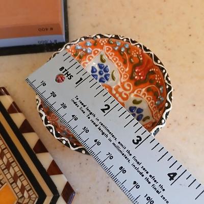 Assortment of collectible Kitchen items - inlayed trivet - Two Turkish bowls - Knife sharpening whetstone - cute, framed sheep