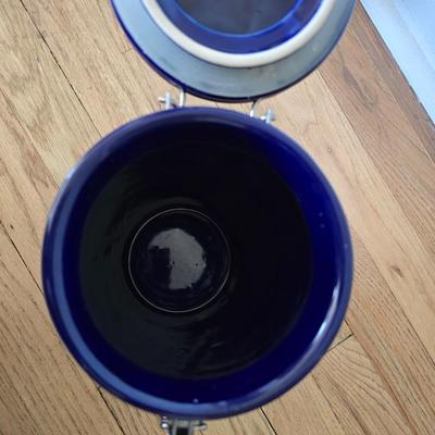 Blue ceramic storage canister and a metal storage box