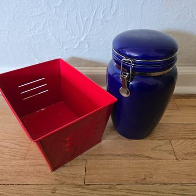 Blue ceramic storage canister and a metal storage box