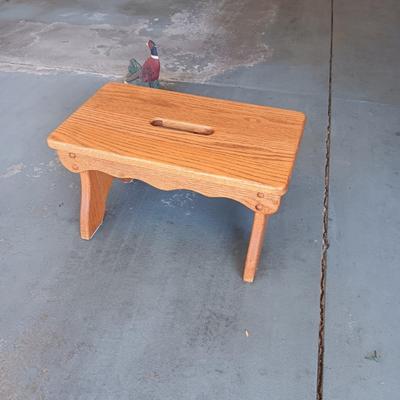 WOODEN STOOL AND A CAST IRON PHEASANT DOOR STOP