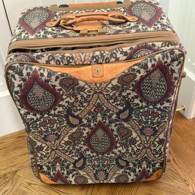 Three fun patterned pieces of luggage