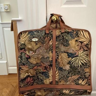 Three fun patterned pieces of luggage