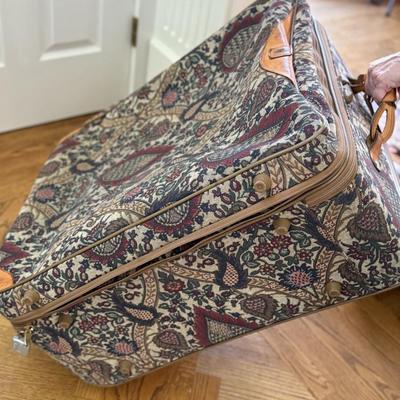 Three fun patterned pieces of luggage