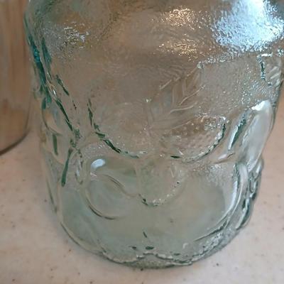 Three glass storage jars / canisters with lids