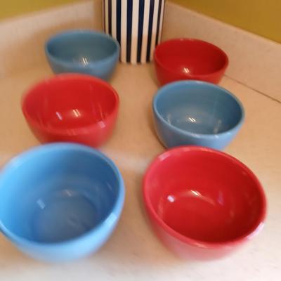 6 deep @Home red and blue kitchen bowls with a lidded storage canister