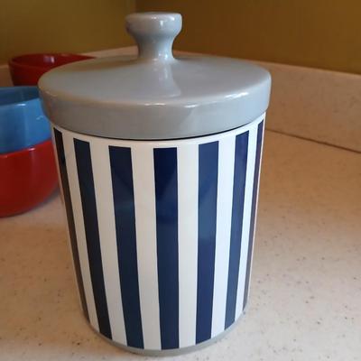 6 deep @Home red and blue kitchen bowls with a lidded storage canister