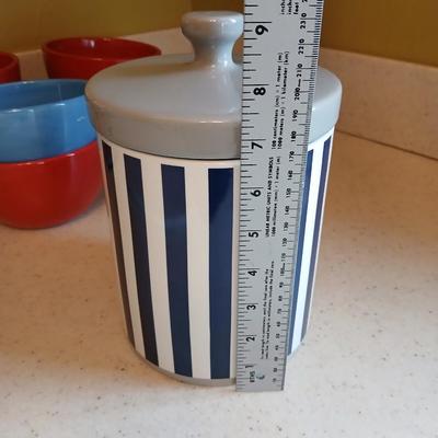 6 deep @Home red and blue kitchen bowls with a lidded storage canister