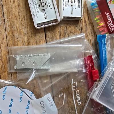 Assortment of homehardware - timers - zip ties - floor pads for furniture legs - and more
