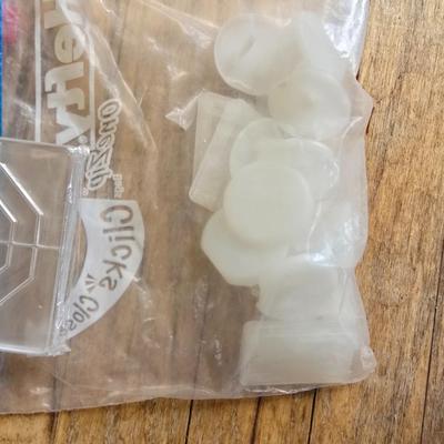 Assortment of homehardware - timers - zip ties - floor pads for furniture legs - and more