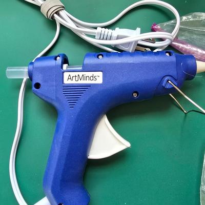 Two crafting glue guns and glue sticks to last a while