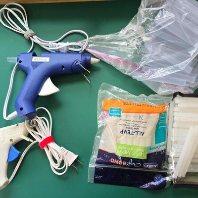 Two crafting glue guns and glue sticks to last a while
