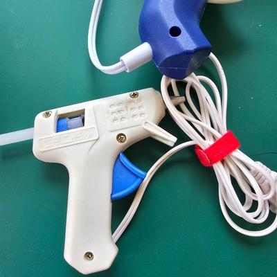 Two crafting glue guns and glue sticks to last a while