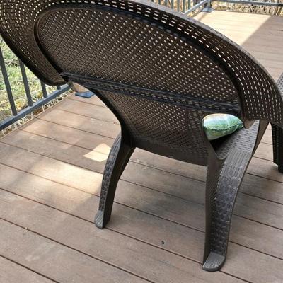 Faux wicker woven patio chair with outdoor throw pillow