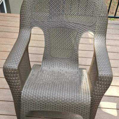 Faux wicker woven patio chair with outdoor throw pillow