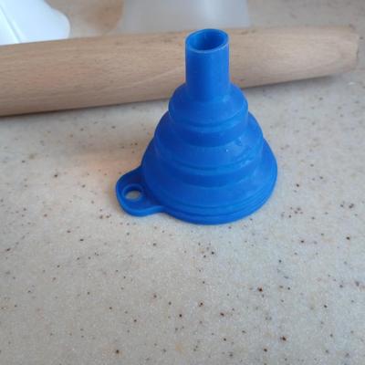 Kitchen needs Funnel assortment - Scraper / cutter tool - and a wooden rolling pin