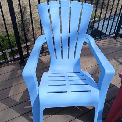 Three plastic Stackable Adirondack Chairs and a outdoor pillow - Keter chair