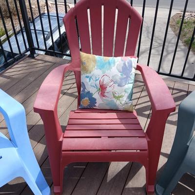 Three plastic Stackable Adirondack Chairs and a outdoor pillow - Keter chair