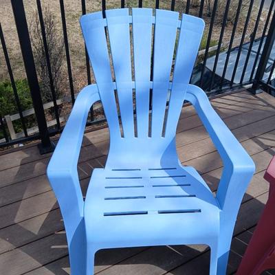 Three plastic Stackable Adirondack Chairs and a outdoor pillow - Keter chair