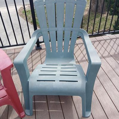 Three plastic Stackable Adirondack Chairs and a outdoor pillow - Keter chair