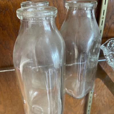 3 milk jars and vintage lids