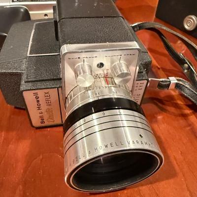 Antique Bell and Howell camera and case