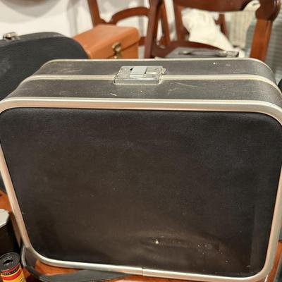 Antique Bell and Howell camera and case