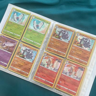 Binder of 100 Pokemon Cards, many Holos